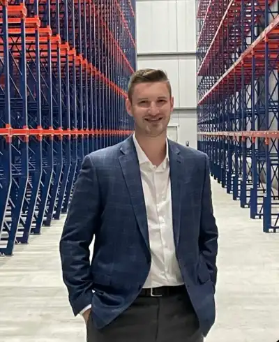 Image of a man in a blue suit